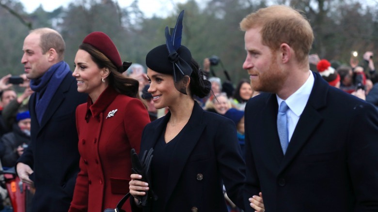 Prince Harry and Prince William with Princess Kate and Meghan Markle