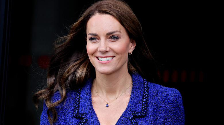 Kate Middleton blue dress, smiling