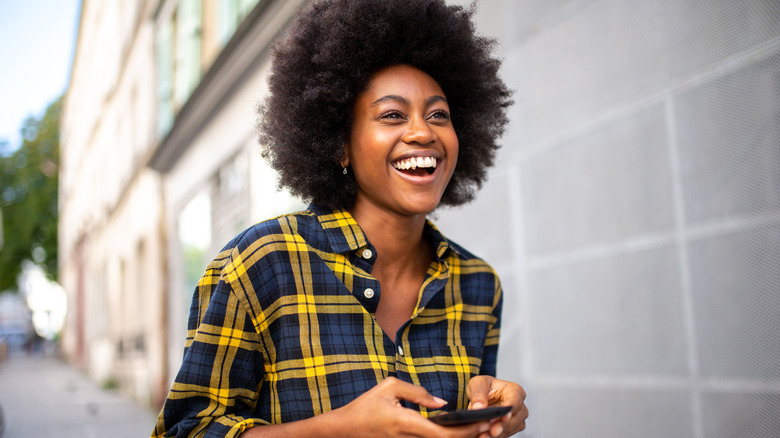 Woman wearing plaid shirt