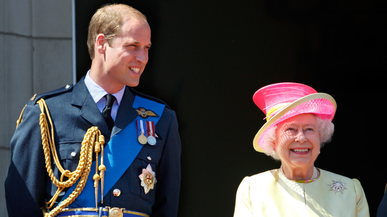 Queen Elizabeth II and Prince William smiling