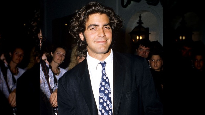 Young George Clooney with longer hair