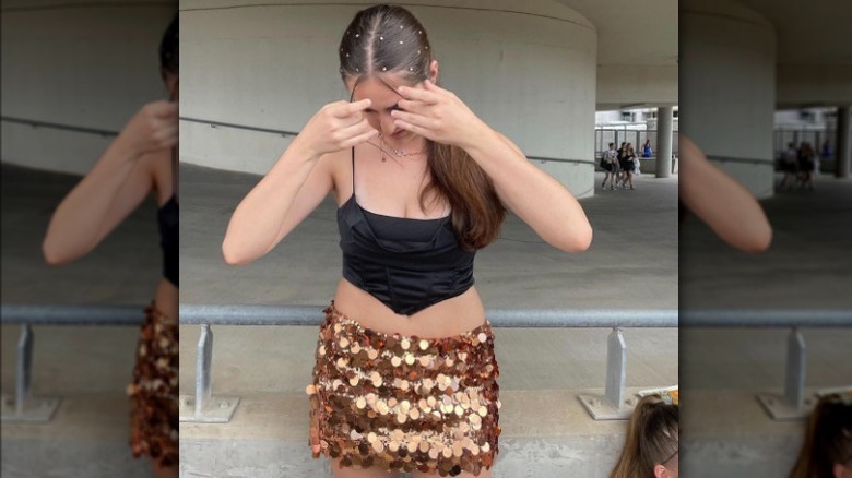 woman with sparkly skirt and hair accessories