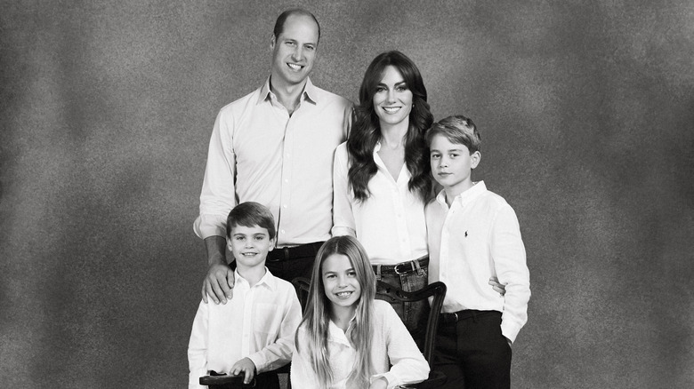 Prince William, Prince of Wales and Catherine, Princess of Wales pose with their three children Prince George, Princess Charlotte and Prince Louis