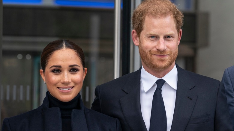 Prince Harry and Meghan Markle smiling 