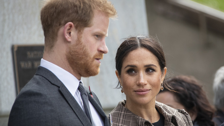 Meghan Markle looking at Prince Harry