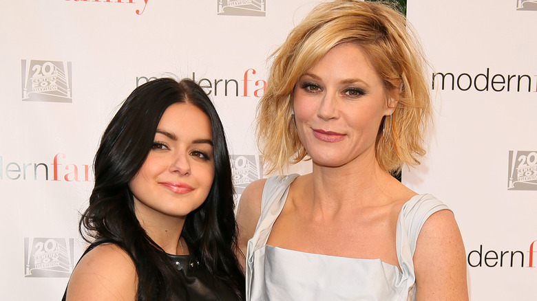 Ariel Winter posing for photos with Julie Bowen