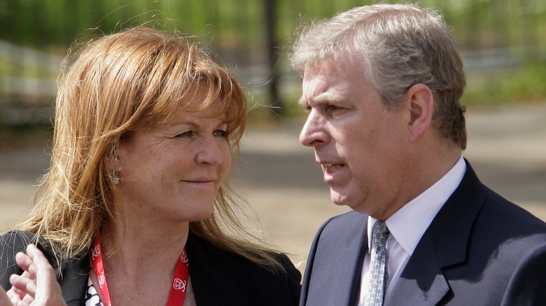 Sarah Ferguson smiling at Prince Andrew while he talks