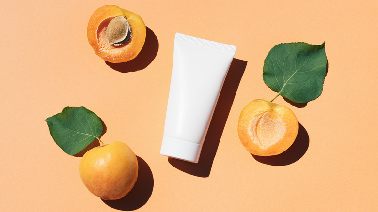 cosmetic tube with apricots