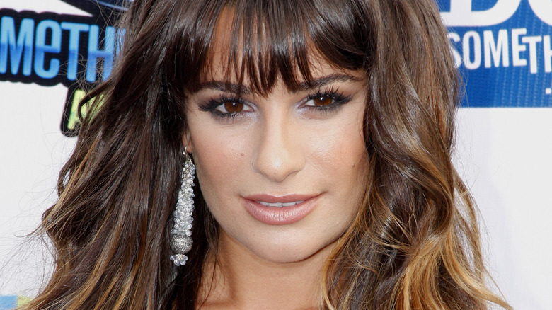 Lea Michele smiling with wavy hair