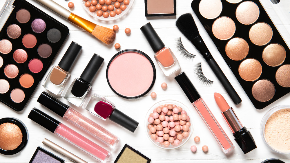 assortment of makeup products