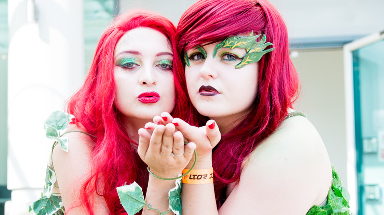 Two Poison Ivy cosplayers