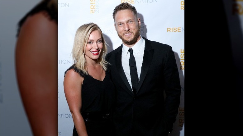 Hilary Duff and Jason Walsh smiling