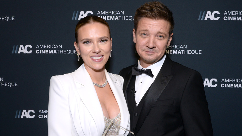 Scarlett Johansson and Jeremy Renner pose at the American Cinematheque