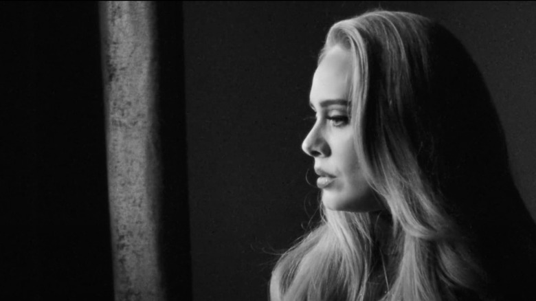 A screenshot of Adele in profile from her music video for "Easy On Me"