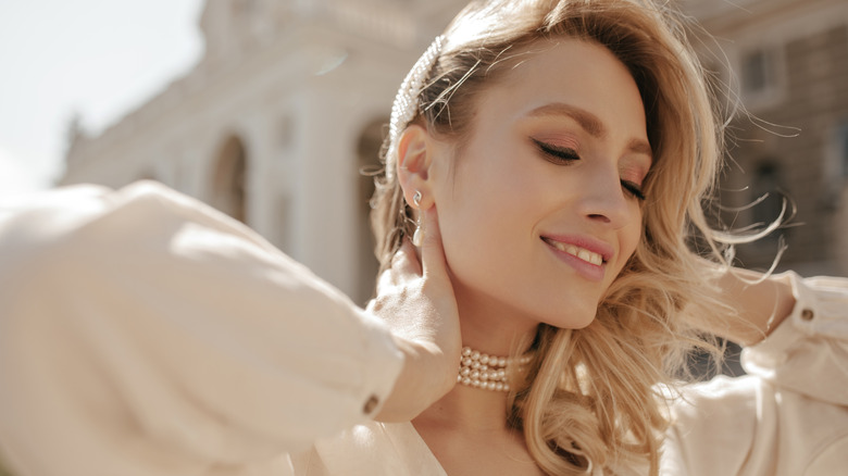 Woman wearing pearl jewelry