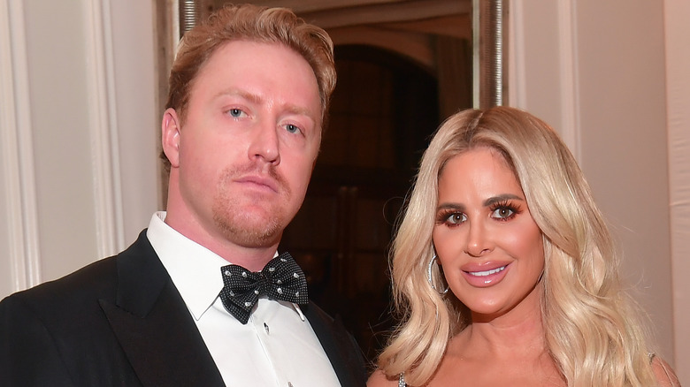 Kroy Biermann and Kim Zolciak posing