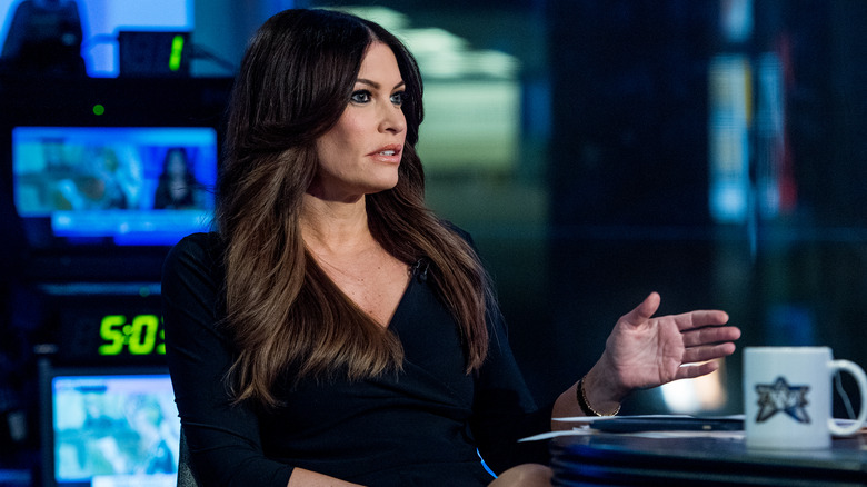 Kimberly Guilfoyle sitting at table on Fox News show