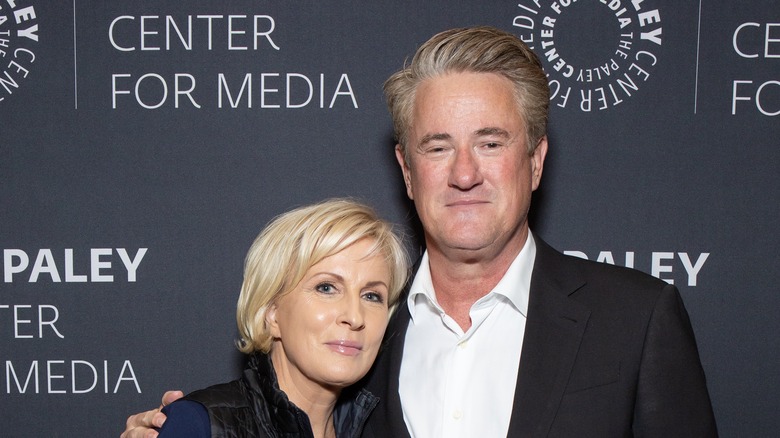 Joe Scarborough and Mika Brzezinski posing