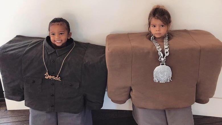 Saint West and Reign Disick dressed up as Kanye West and Lil Pump for Halloween in 2018