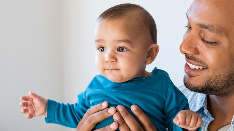 baby boy being held