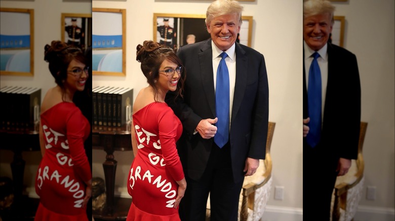 Lauren Boebert wearing Let's Go Brandon dress standing with Donald Trump