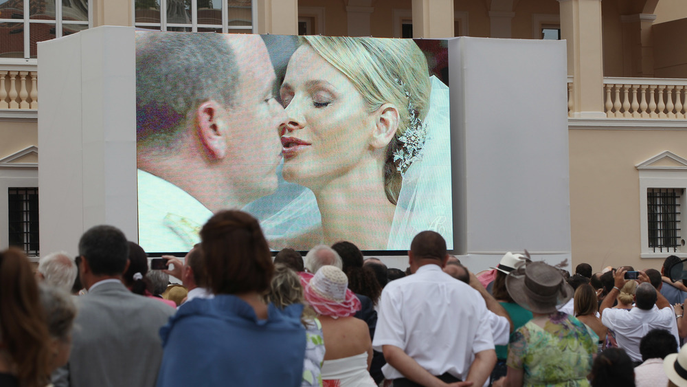 Princess Charlene and Prince Albert of Monaco kissing