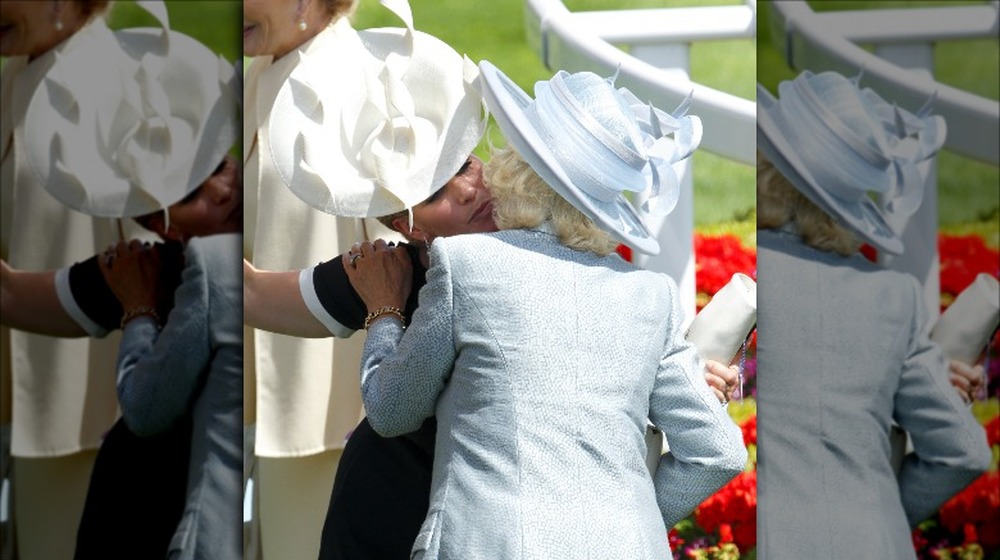 Camilla Parker Bowles and Zara Phillips greeting each other