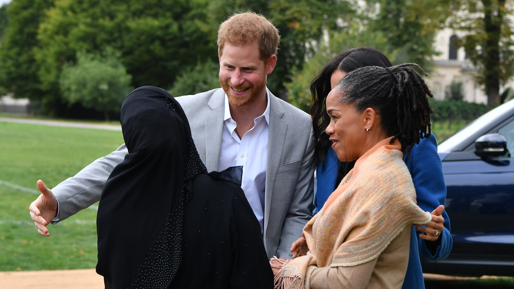 Prince Harry greeting people at event