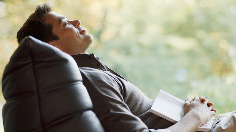 Man napping in chair