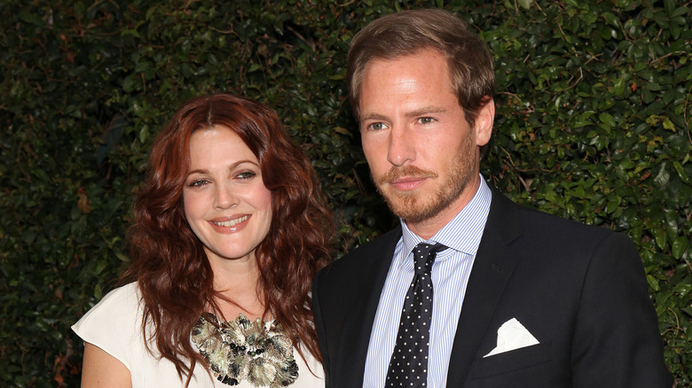 Drew Barrymore and Will Kopelman posing