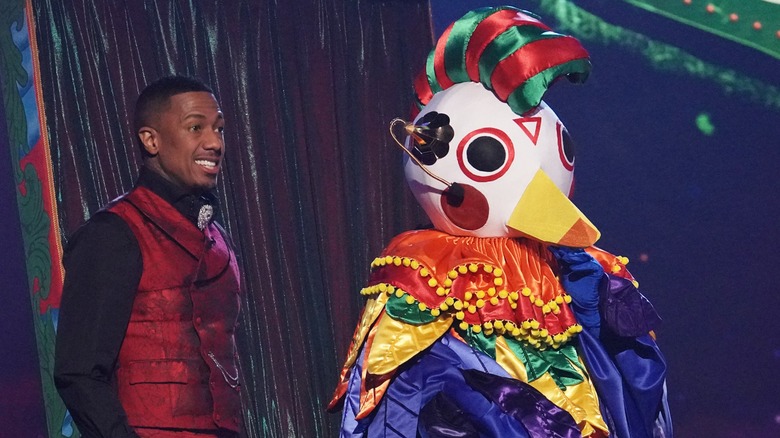 NIck Cannon and Jack-in-the-Box standing onstage