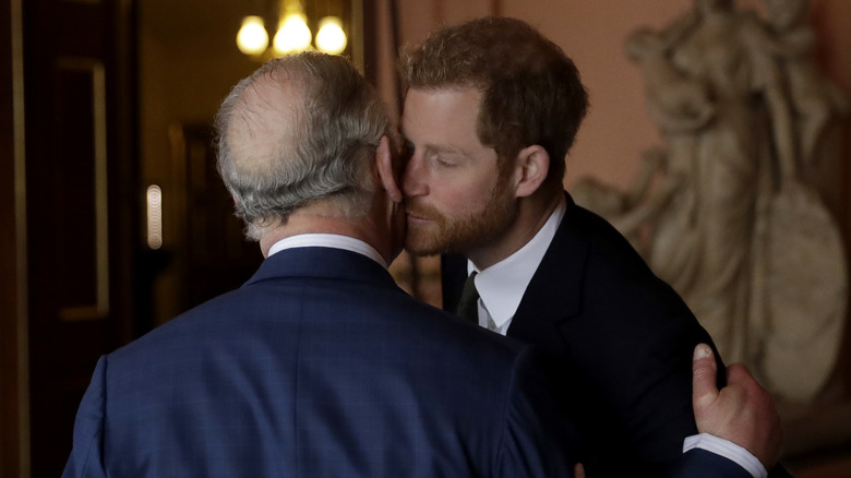 Charles greeting Harry in 2018