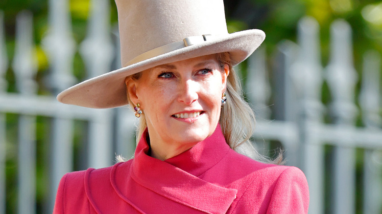 Sophie wearing a red coat