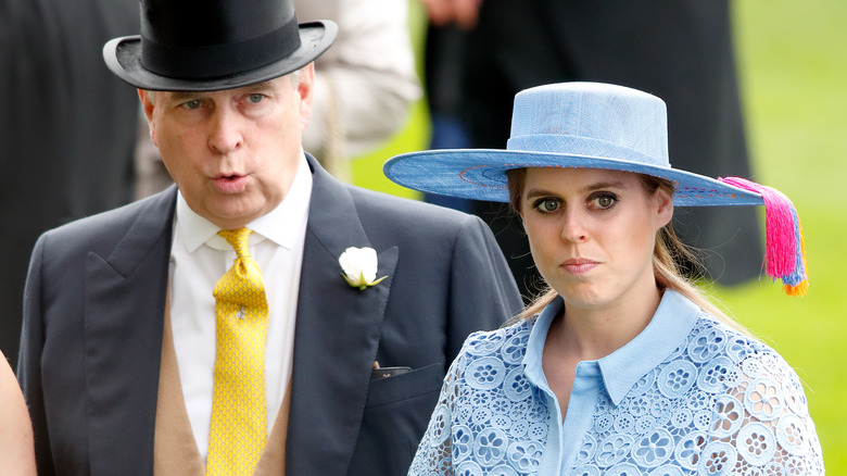 Prince Andrew and Princess Beatrice posing 