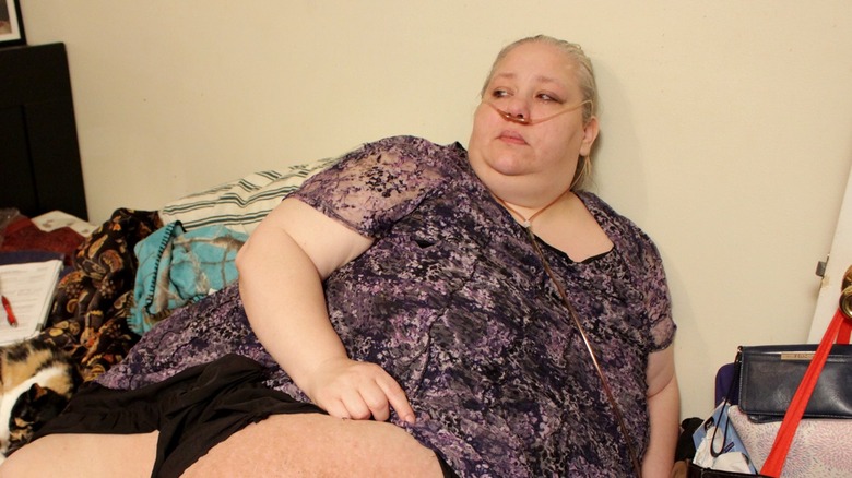 Angela Gutierrez sitting on a bed on My 600-lb Life