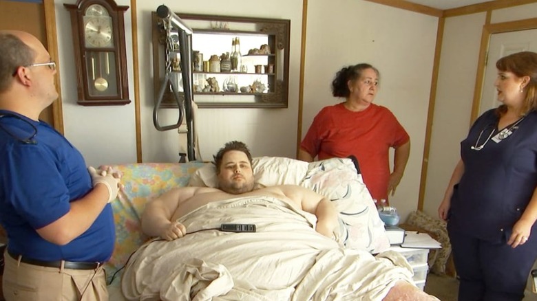 James King in bed with family and medical professionals around him on My 600-lb Life