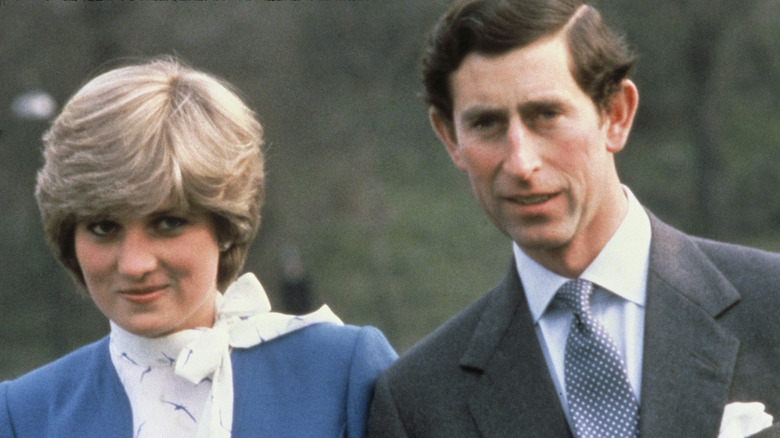 King Charles III with Princess Diana outdoors