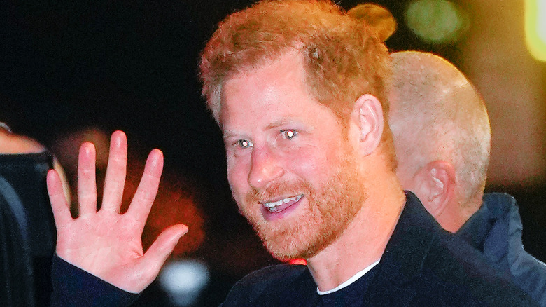 Prince Harry smiling and waving 