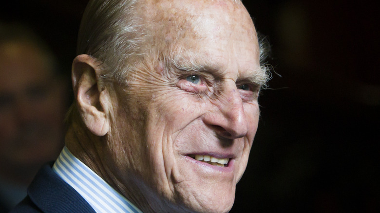 Elderly Prince Philip suit smiling 