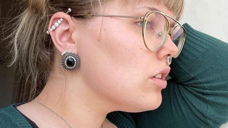 woman with industrial ear piercing