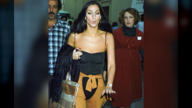 Cher in suede chaps 