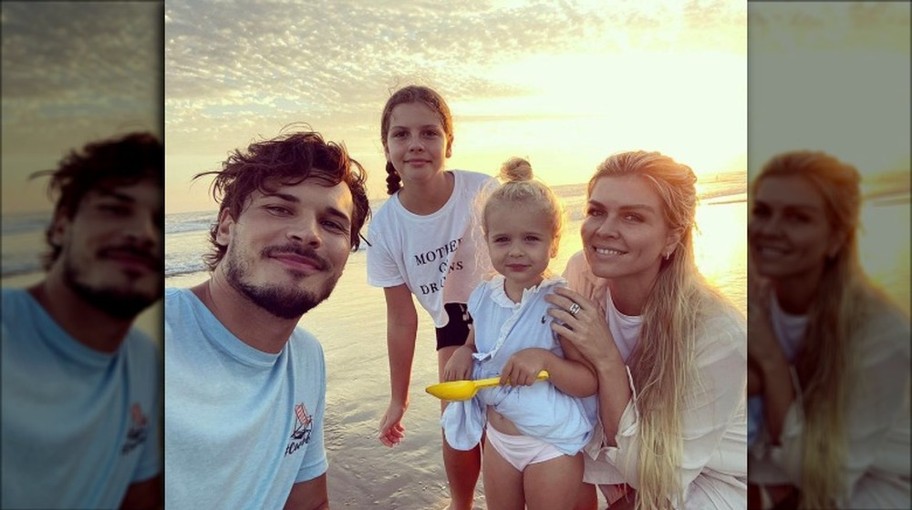 Gleb Savchenko, Elena Samodanova, and their children