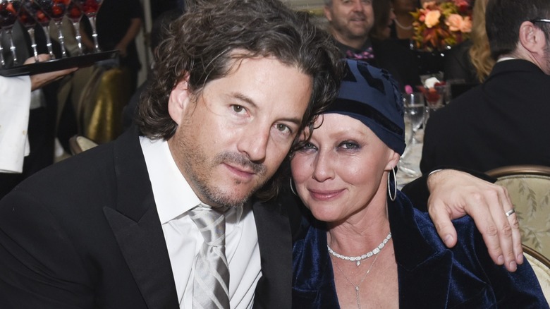 Kurt Iswarienko arm around Shannen Doherty