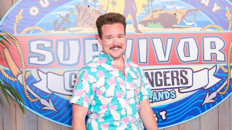 Zeke Smith posing at event