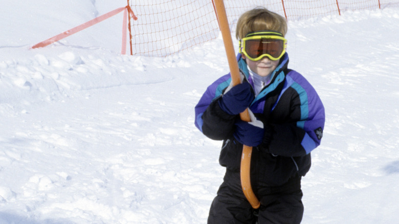 Prince Harry as a young boy skiing