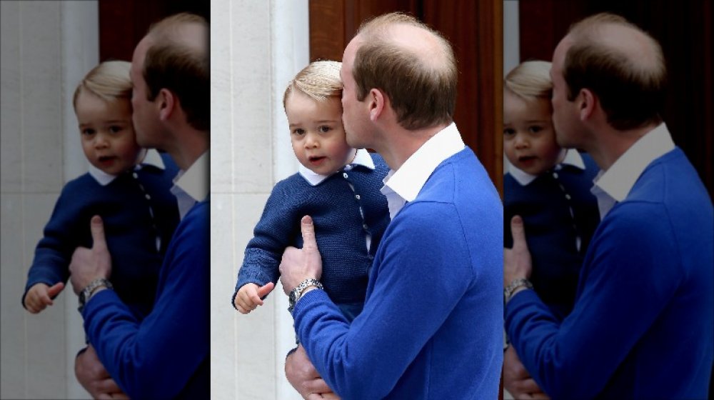 Prince William giving his son an epic royal kiss