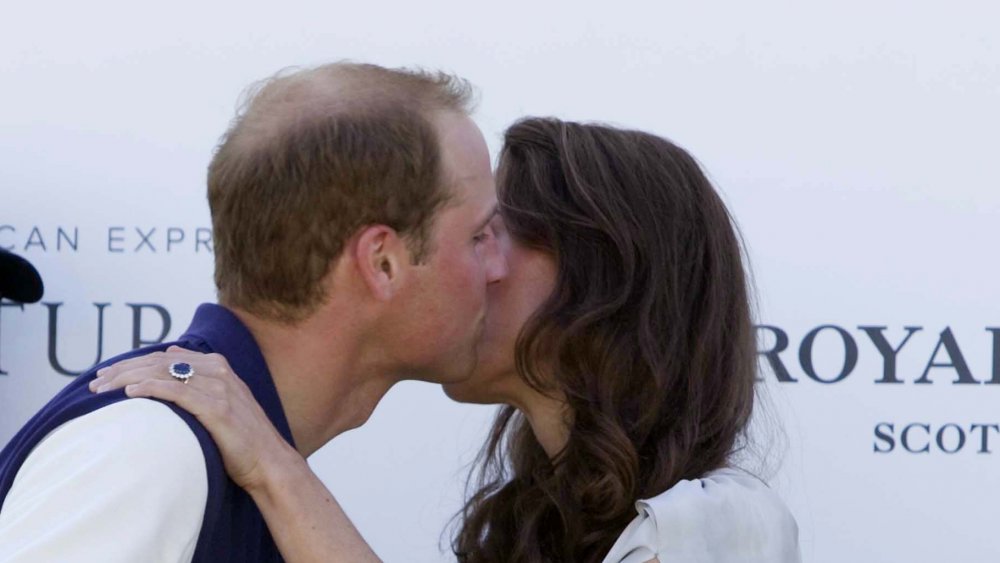 Prince William and Kate Middleton sharing an epic royal kiss