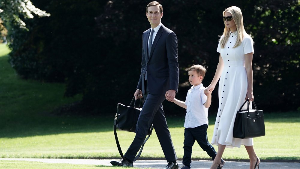 Ivanka Trump with Jared Kushner and their son