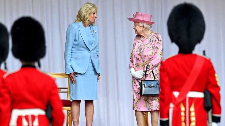 Jill Biden in blue with Queen Elizabeth