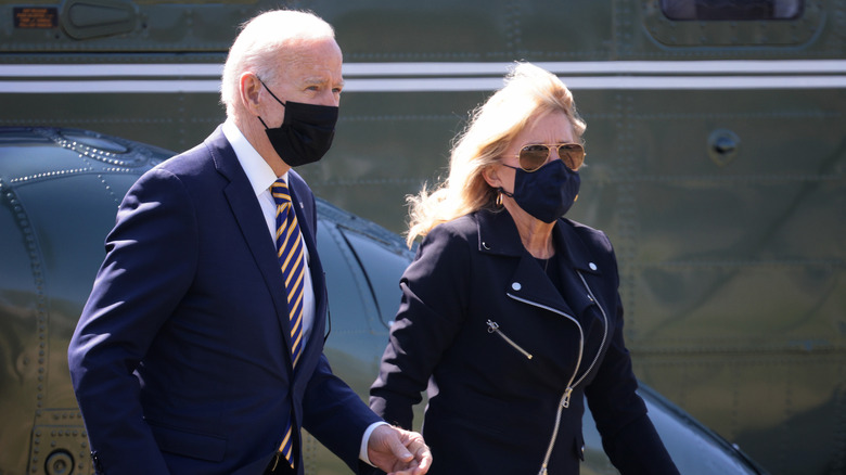 Joe, Jill Biden in black moto jacket